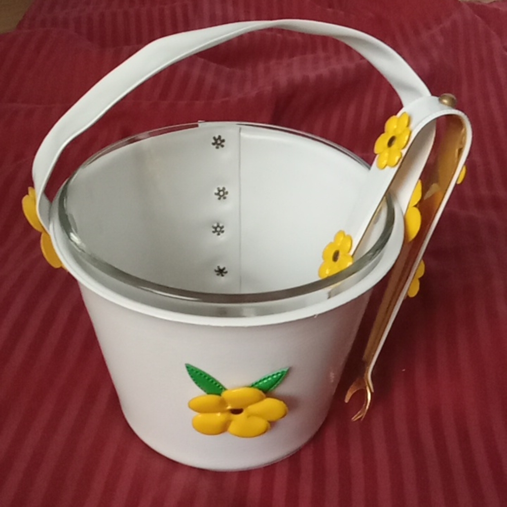 Vintage glass ice bucket with cover and matching tongs.